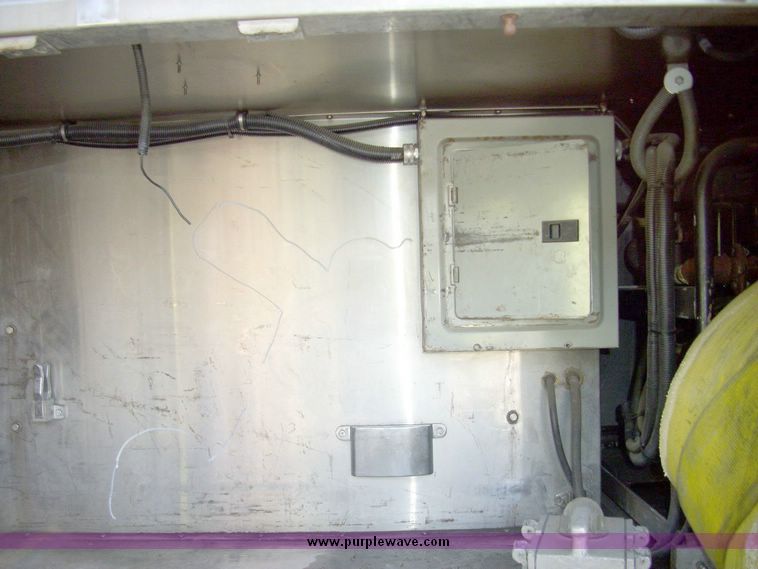 image for item 4651 1993 Sutphen HS2789 75' Quint aerial platform truck