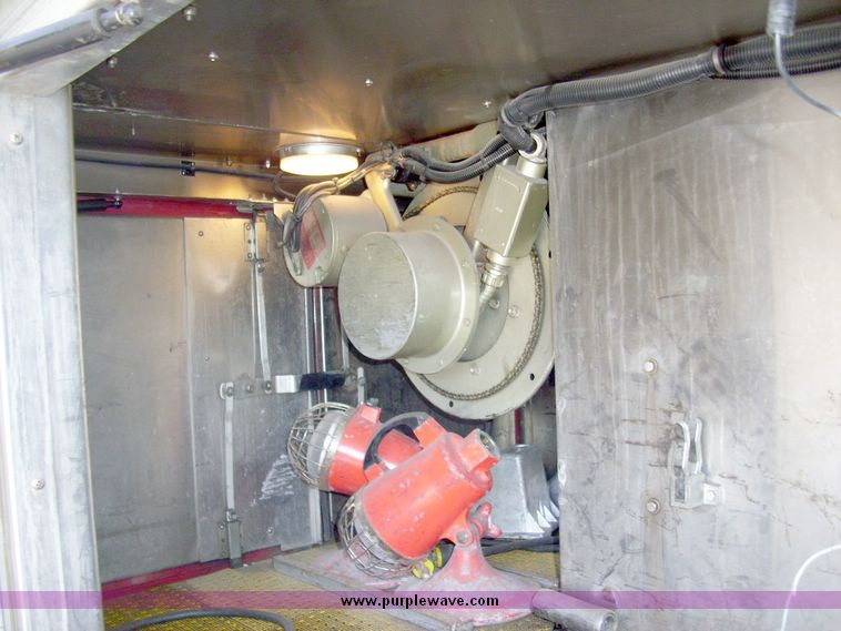 image for item 4651 1993 Sutphen HS2789 75' Quint aerial platform truck