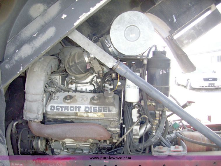 image for item 4651 1993 Sutphen HS2789 75' Quint aerial platform truck