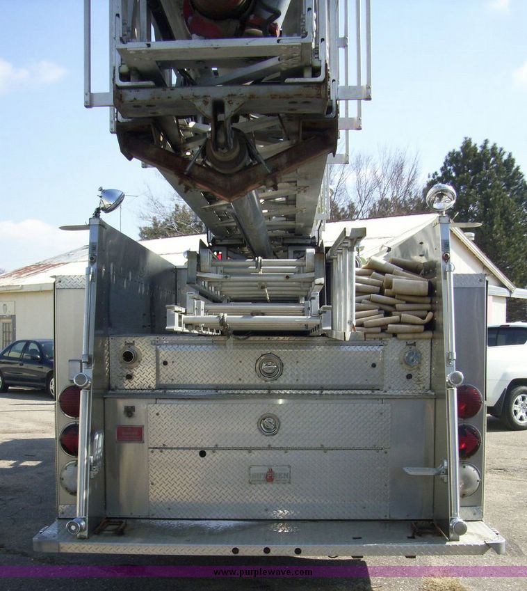 image for item 4652 1987 Sutphen MT1063 75' Quint pumper platform truck