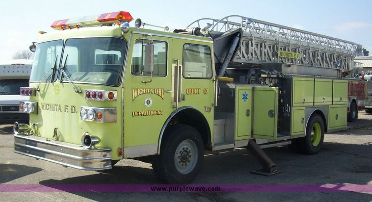 image for item 4652 1987 Sutphen MT1063 75' Quint pumper platform truck