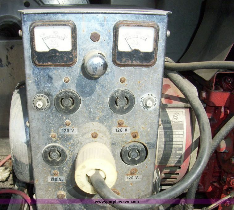 image for item 4652 1987 Sutphen MT1063 75' Quint pumper platform truck