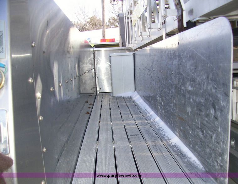 image for item 4652 1987 Sutphen MT1063 75' Quint pumper platform truck