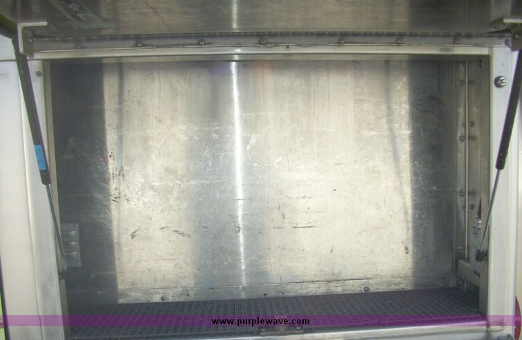 image for item 4652 1987 Sutphen MT1063 75' Quint pumper platform truck