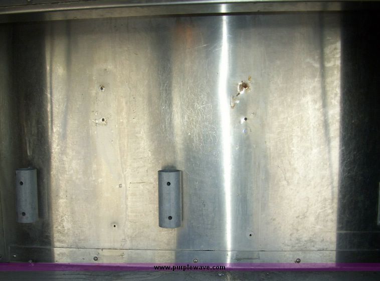 image for item 4652 1987 Sutphen MT1063 75' Quint pumper platform truck