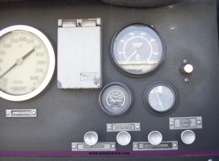 image for item 4652 1987 Sutphen MT1063 75' Quint pumper platform truck