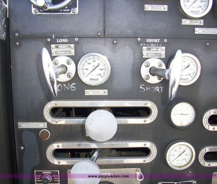 image for item 4652 1987 Sutphen MT1063 75' Quint pumper platform truck
