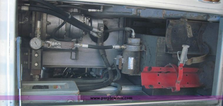 image for item 4652 1987 Sutphen MT1063 75' Quint pumper platform truck