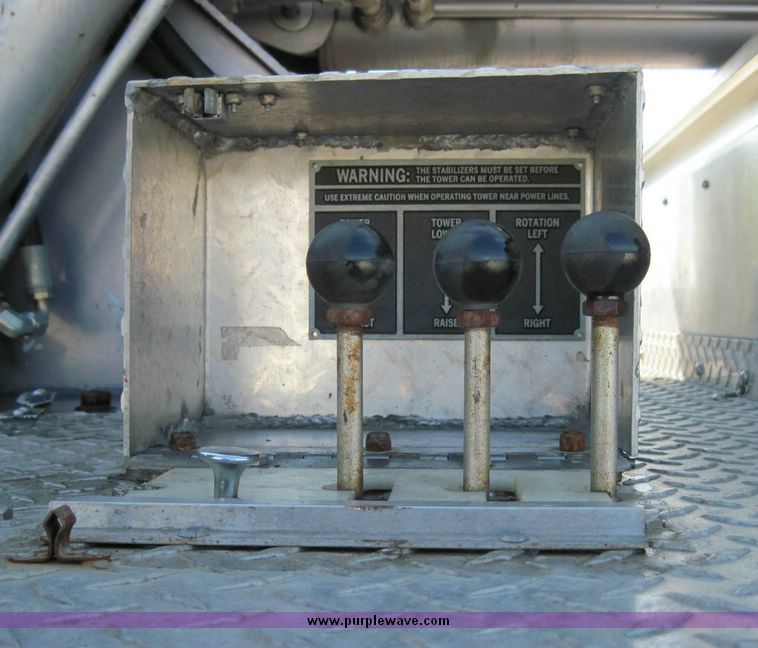 image for item 4652 1987 Sutphen MT1063 75' Quint pumper platform truck