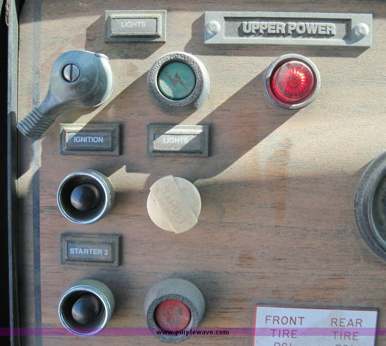image for item 4652 1987 Sutphen MT1063 75' Quint pumper platform truck