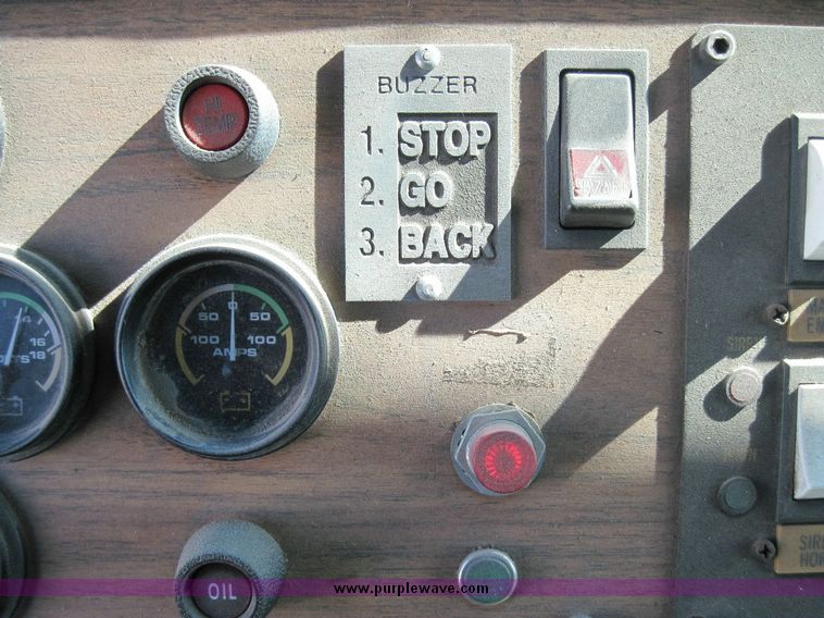 image for item 4652 1987 Sutphen MT1063 75' Quint pumper platform truck