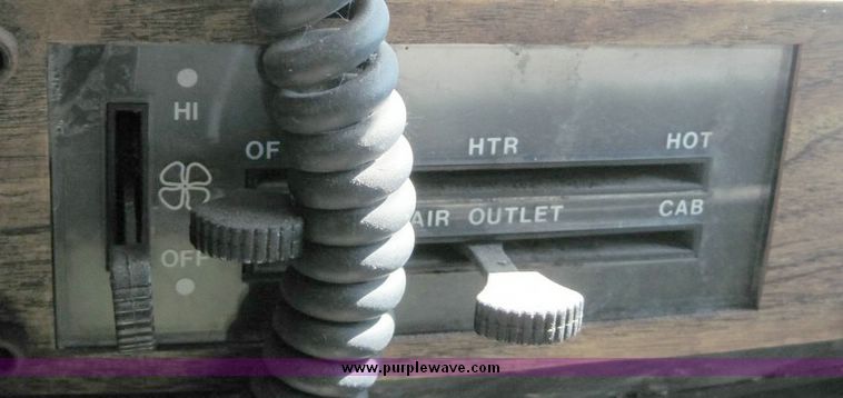 image for item 4652 1987 Sutphen MT1063 75' Quint pumper platform truck
