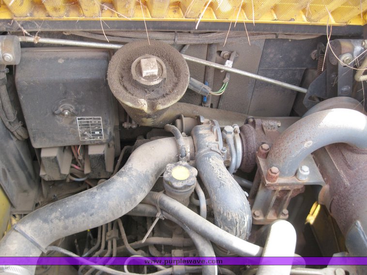 image for item 1752 2004 New Holland LS170 skid steer