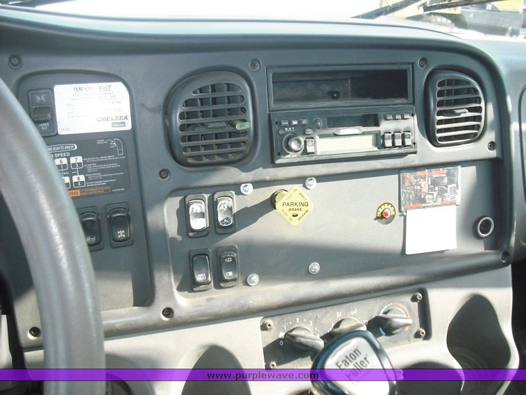 image for item 3245 2006 Freightliner M2 106 rollback truck