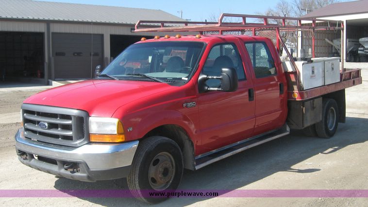 image for item 3949 1999 Ford F-350 Suder Duty pickup with custom flatbed