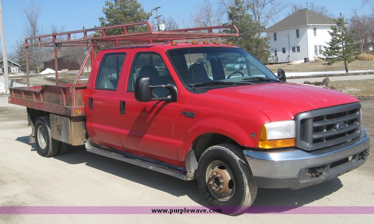 image for item 3949 1999 Ford F-350 Suder Duty pickup with custom flatbed