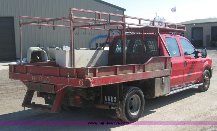 image for item 3949 1999 Ford F-350 Suder Duty pickup with custom flatbed