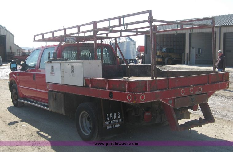 image for item 3949 1999 Ford F-350 Suder Duty pickup with custom flatbed