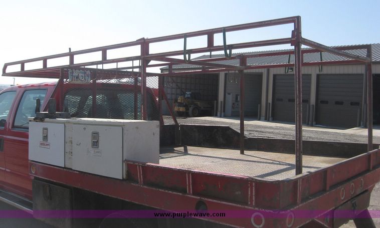 image for item 3949 1999 Ford F-350 Suder Duty pickup with custom flatbed