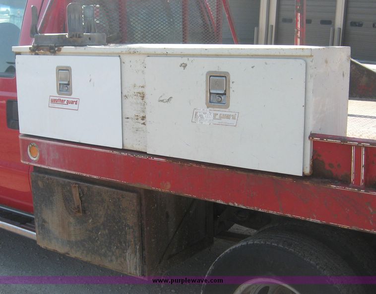 image for item 3949 1999 Ford F-350 Suder Duty pickup with custom flatbed