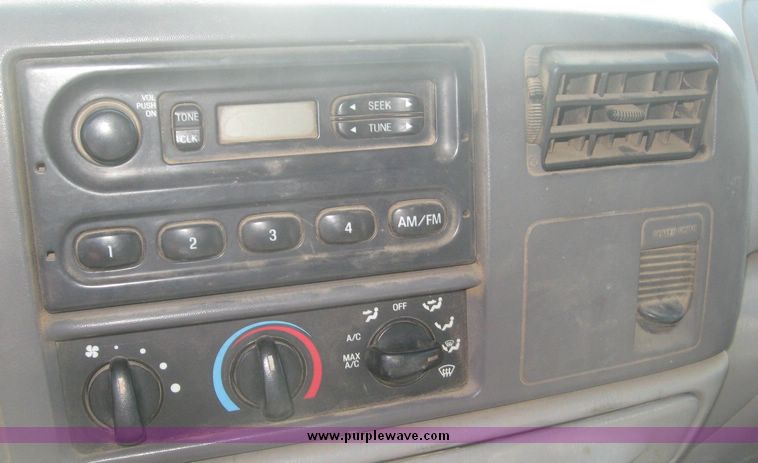 image for item 3949 1999 Ford F-350 Suder Duty pickup with custom flatbed