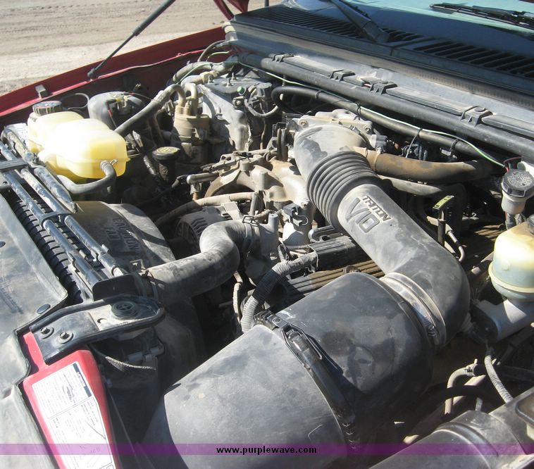 image for item 3949 1999 Ford F-350 Suder Duty pickup with custom flatbed