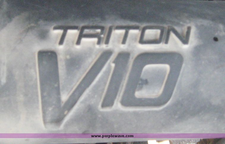 image for item 3949 1999 Ford F-350 Suder Duty pickup with custom flatbed