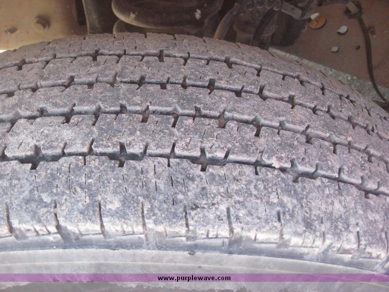 image for item 3949 1999 Ford F-350 Suder Duty pickup with custom flatbed