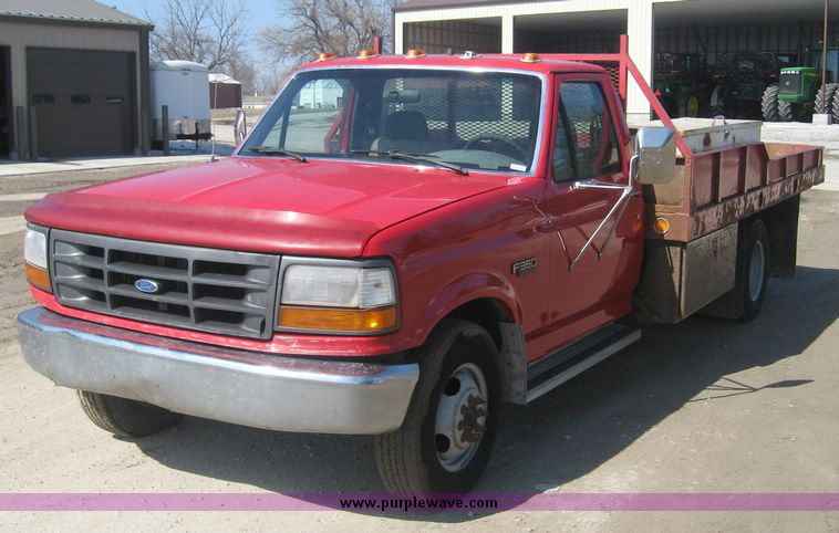 image for item 3950 1992 Ford F-350 pickup with custom 12' flatbed