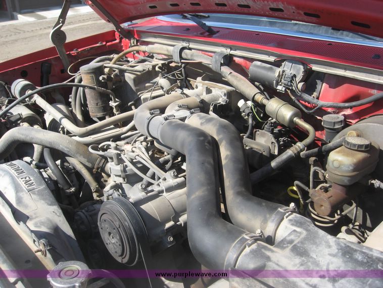 image for item 3950 1992 Ford F-350 pickup with custom 12' flatbed