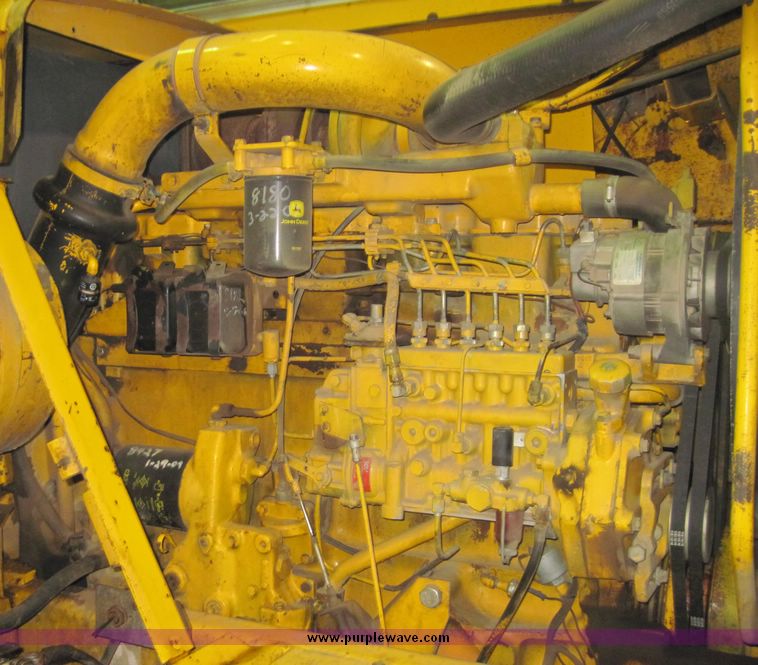 image for item 4582 1980 John Deere 762 paddle scrapper