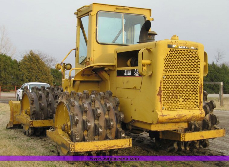 image for item 4585 Caterpillar 815 compactor