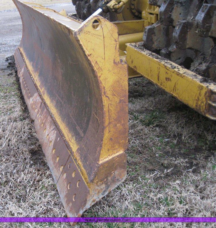 image for item 4585 Caterpillar 815 compactor