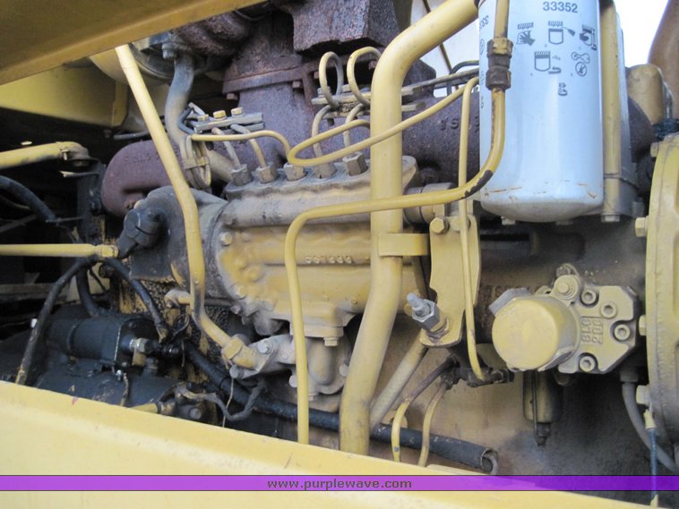 image for item 4585 Caterpillar 815 compactor