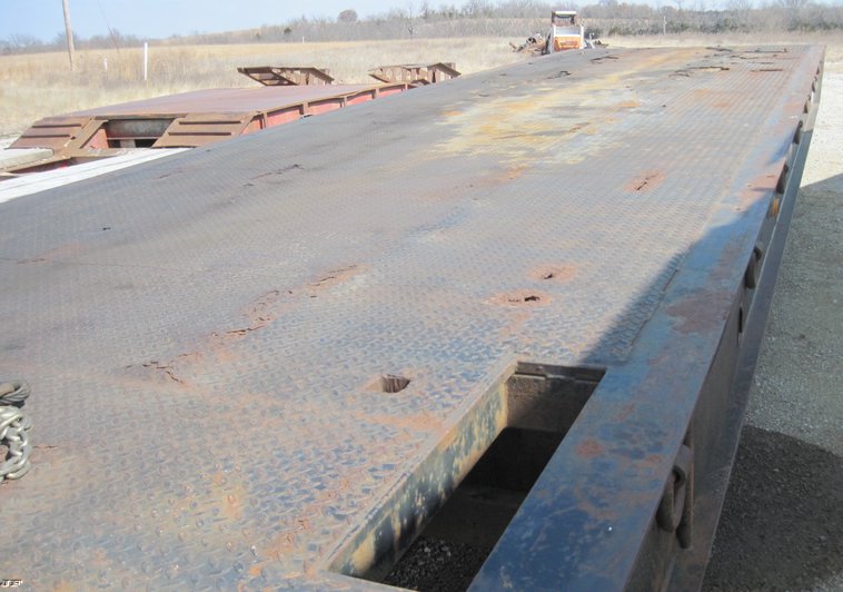 image for item 4688 1984 Landall deck over tandem axle trailer