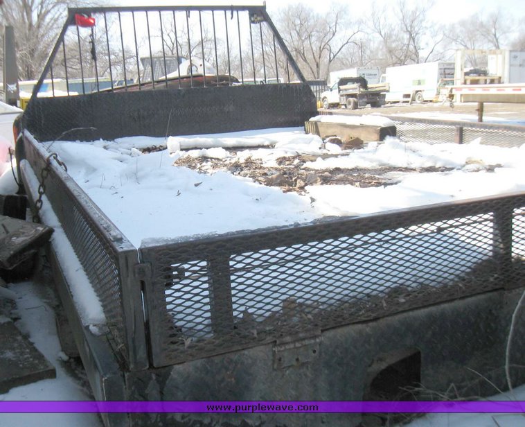 image for item 5323 Flatbed with headache rack