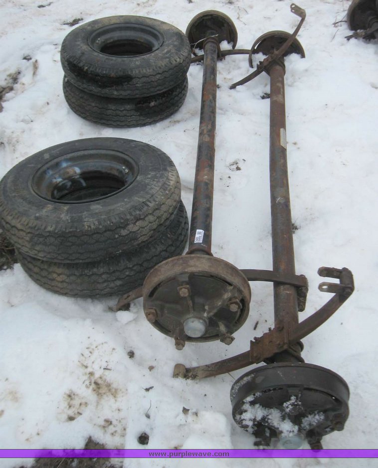 (2) Dexter axles with springs and hubs in Moberly, MO Item 5480 sold Purple Wave