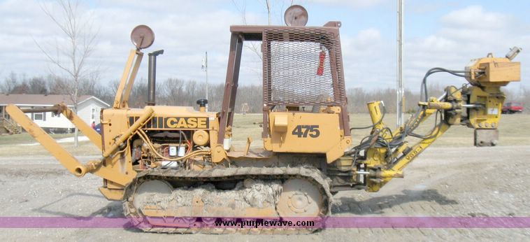 image for item 5693 Case 475 crawler tractor with vibratory plow