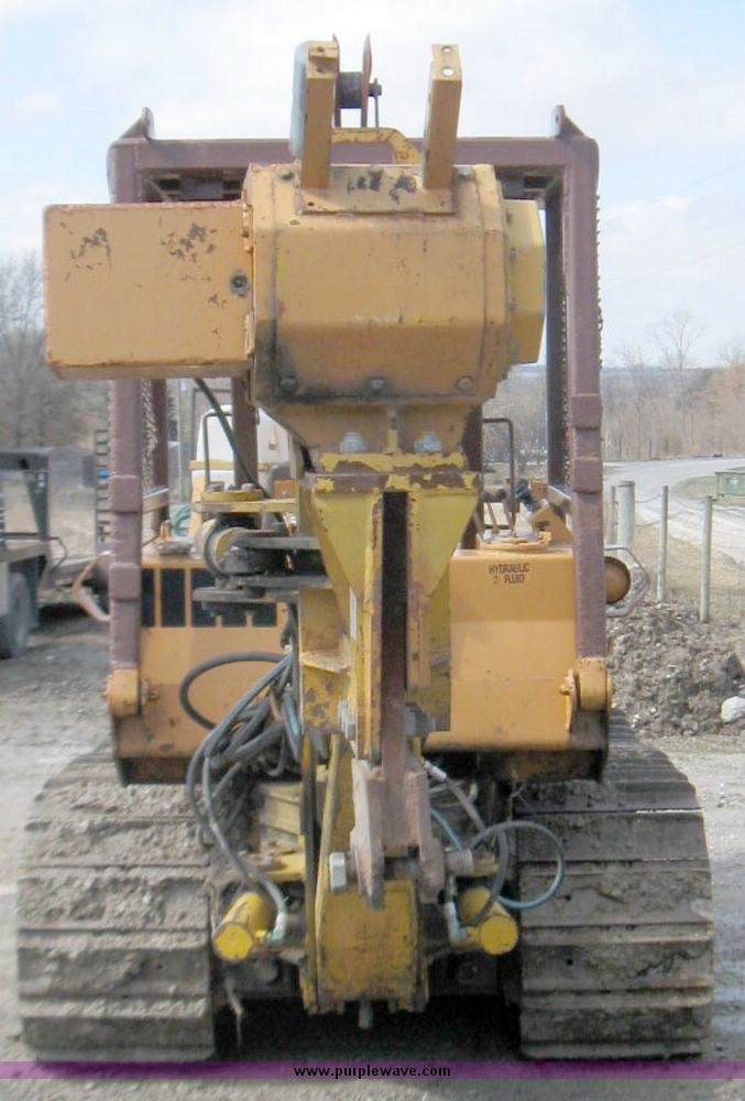 image for item 5693 Case 475 crawler tractor with vibratory plow