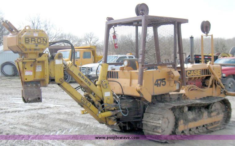 image for item 5693 Case 475 crawler tractor with vibratory plow