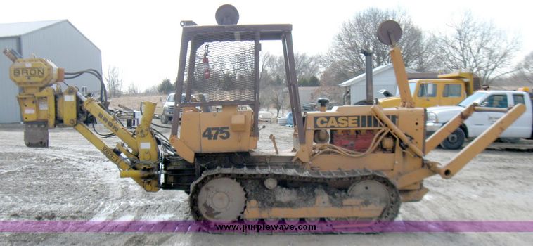 image for item 5693 Case 475 crawler tractor with vibratory plow