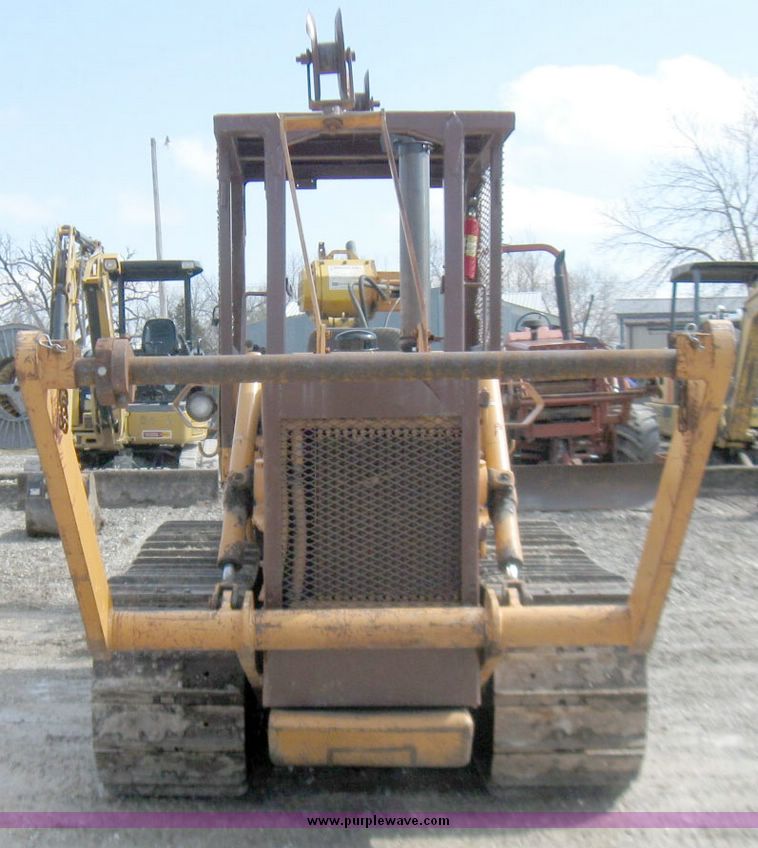 image for item 5693 Case 475 crawler tractor with vibratory plow