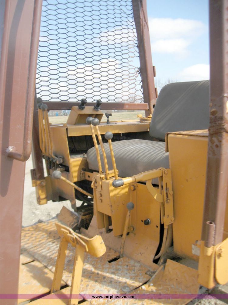 image for item 5693 Case 475 crawler tractor with vibratory plow