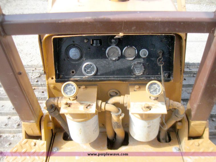 image for item 5693 Case 475 crawler tractor with vibratory plow