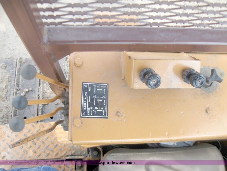 image for item 5693 Case 475 crawler tractor with vibratory plow