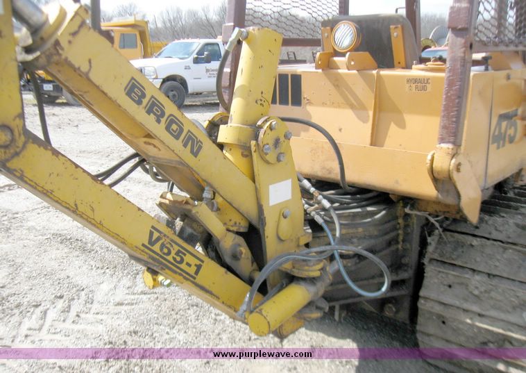image for item 5693 Case 475 crawler tractor with vibratory plow