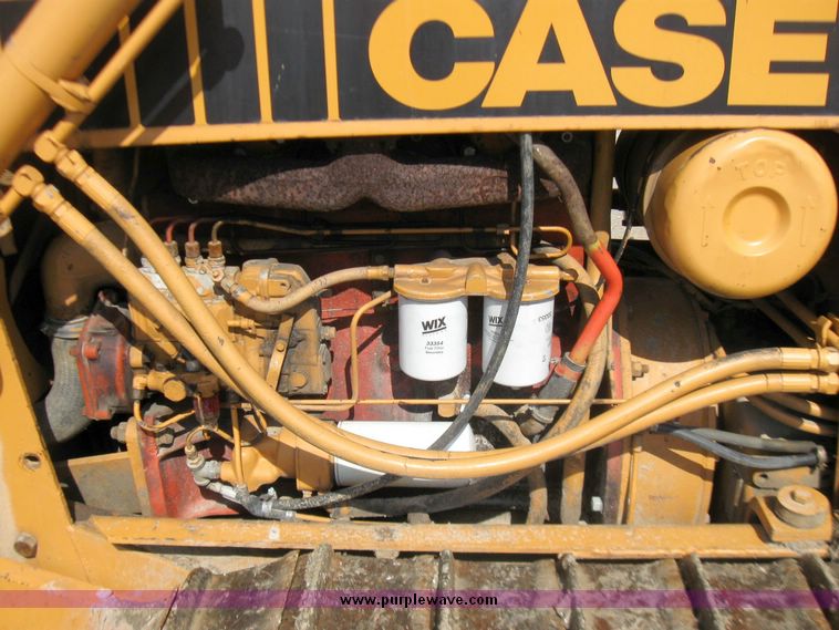 image for item 5693 Case 475 crawler tractor with vibratory plow