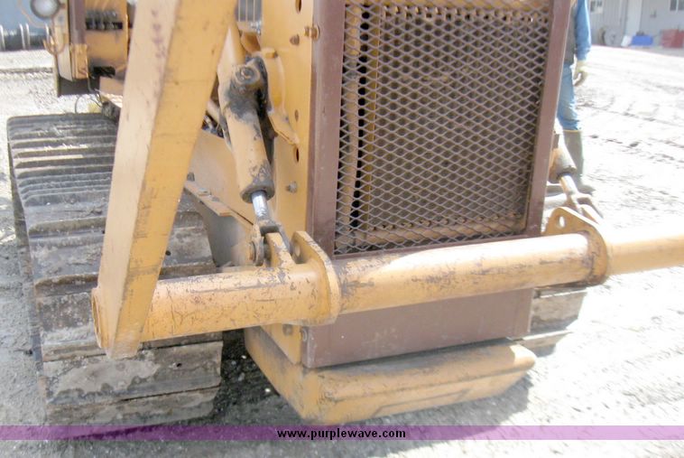 image for item 5693 Case 475 crawler tractor with vibratory plow