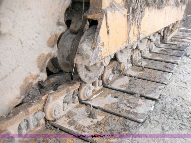 image for item 5693 Case 475 crawler tractor with vibratory plow