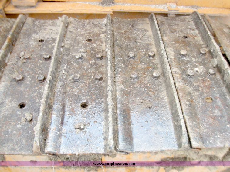 image for item 5693 Case 475 crawler tractor with vibratory plow